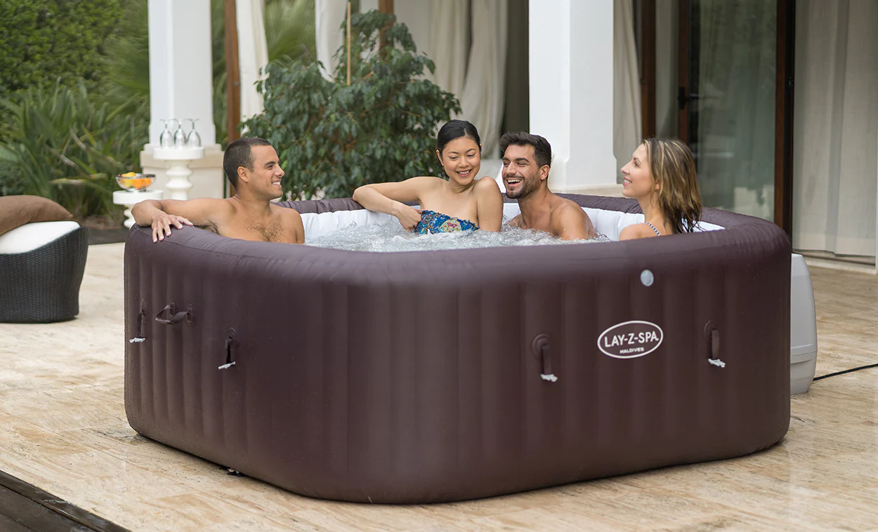 friends-in-maldives-lay-z-spa-hydrojet-hot-tub-during-the-day Lay-Z-Spa Maldives 7 Person HydroJet Pro Hot Tub - Image 1